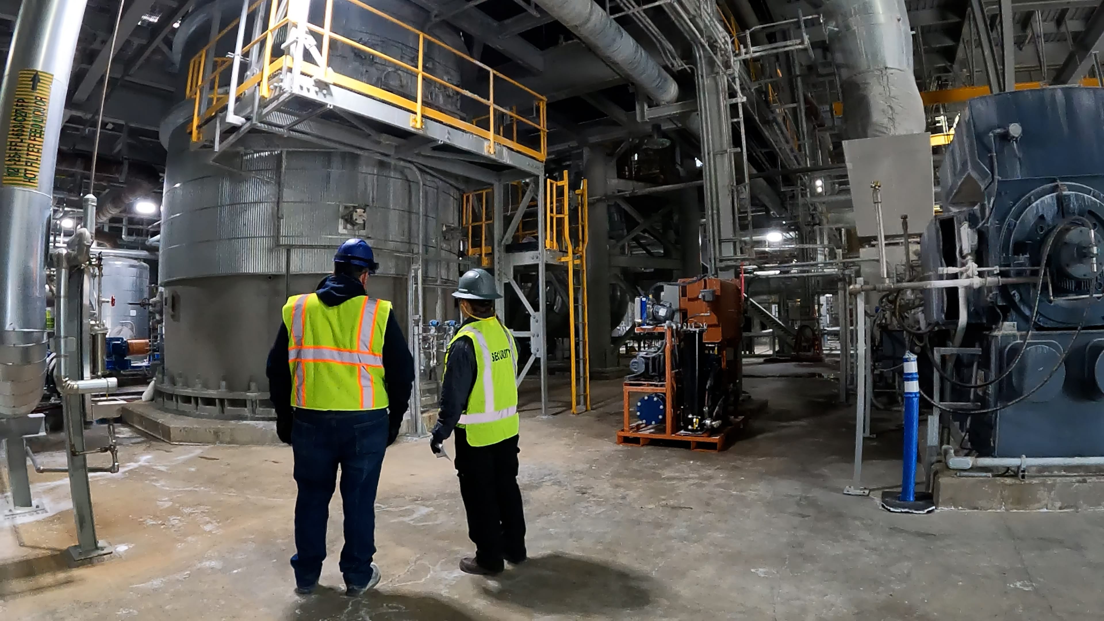 WE Soda US soda ash processing plant with workers in PPE hard hats